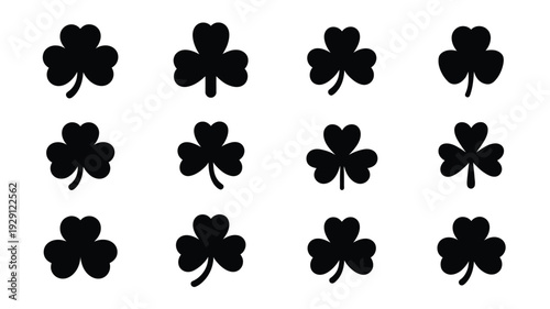 A bundle of 12 st patrick's day silhouettes black four leaf clover icons on white background shamrock symbols for luck and celebration