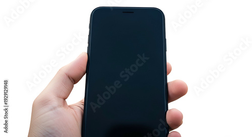 Human Hand Holding Smartphone Device With Blank Screen Against Black Backdrop