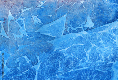 Scanned handmade watercolor background in layered blue tones, featuring organic paint textures and soft pigment transitions for creative design use.