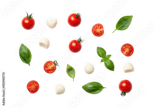 Fresh strawberries and green leaves scattered on a white background