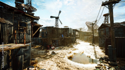 Photos bright muddy lane through derelict shantytown, towering turbine silhouette overh