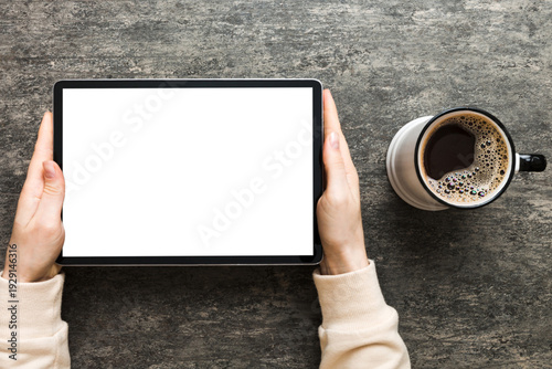 Wallpaper Mural Close up image woman hands holding digital tablet with blank copy space screen for your text message or promotional content om table with cup of coffee. hands of a woman holding blank tablet device Torontodigital.ca