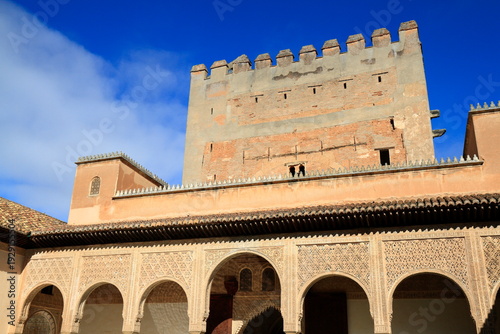 Alhambra Courtyard With Ornate Moorish Arches and Tower