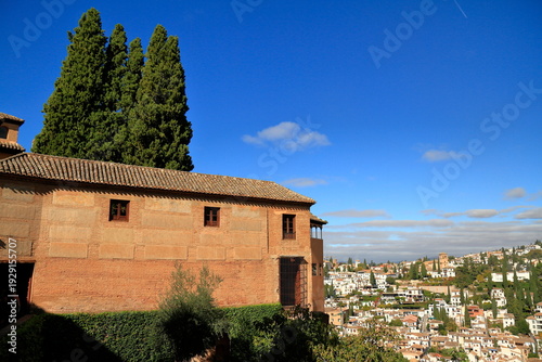 Alhambra Courtyard With Ornate Moorish Arches and Tower