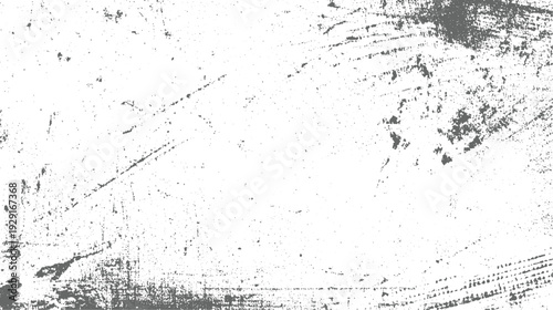 Abstract distressed surface with scattered dark gray speckles and linear scratches on white background