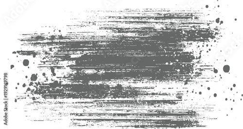 Gray distressed horizontal brush stroke texture with scattered ink splatters on white background