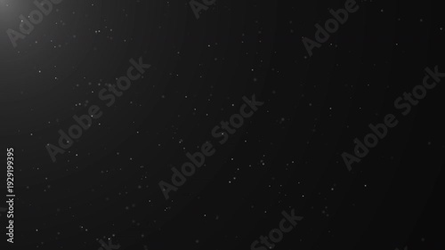 Slow motion of floating atmospheric dust particles in air with sunlight on black background