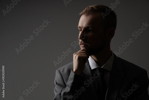 Silhouette of thoughtful bu...