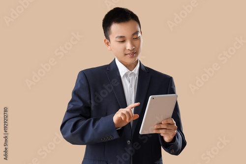 Chinese businessman working...