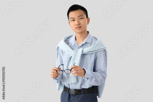 Chinese businessman with ey...