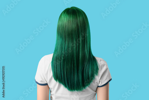 Young woman with green hair...