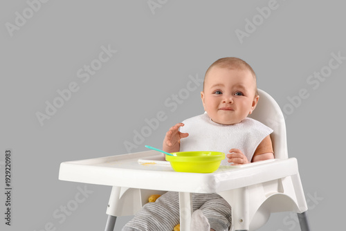Sad little baby with food s...