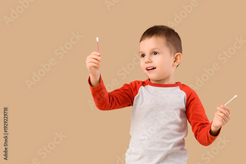 Cute little boy with cotton...