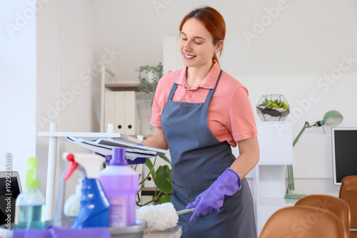 Female janitor cleaning des...
