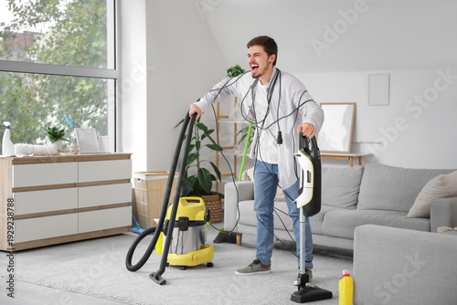 Stressed young man wrapped ...