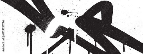 Graffiti Art Tag: A bold black graffiti tag sprayed on a wall, showcasing dripping paint and a dynamic, urban art style.