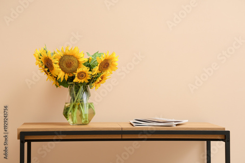 Vase with beautiful sunflow...