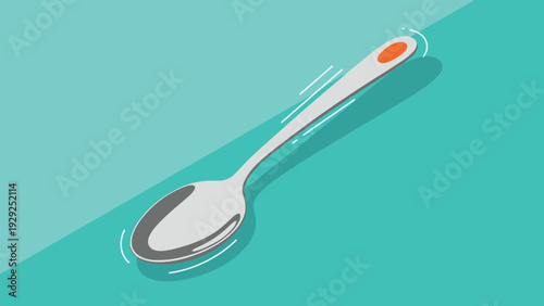 Long metal spoon with a gray body and a small orange accent on the handle resting on a turquoise background with motion lines.