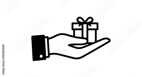 A hand holding a gift box symbolizing giving or receiving presents during special occasions.