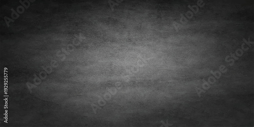 A dark grunge blackboard texture with a vintage concrete backdrop