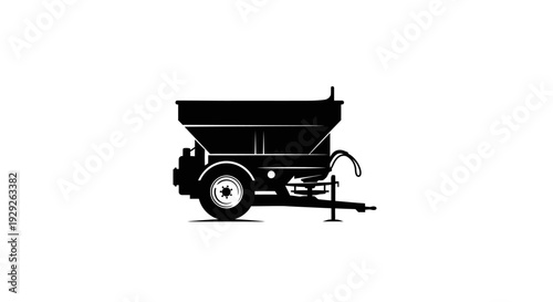 Black silhouette of a fertilizer spreader on a trailer with a single wheel isolated on white background for gardening and landscaping concepts