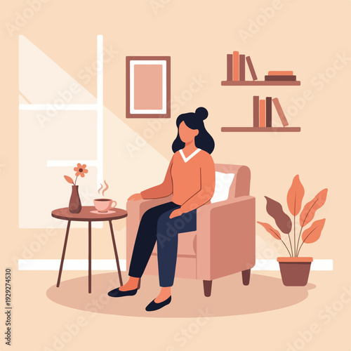 A woman is in a cozy interior, sitting in a chair with a cup of coffee