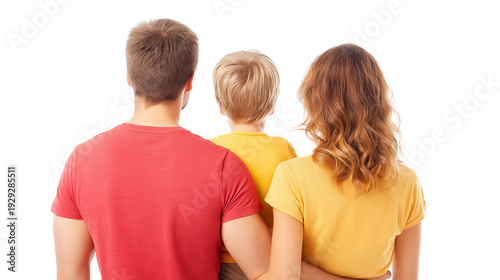 Young family of three standing together seen from back