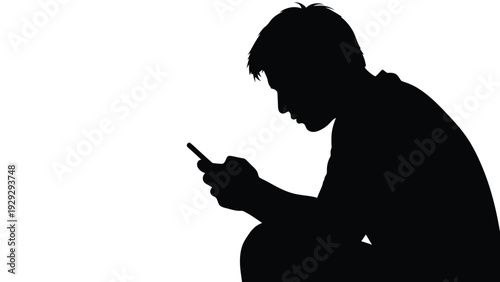 Silhouette of a young person intensely focused while using a small mobile communication device against a stark white background