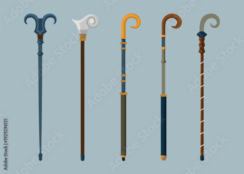 Five ornate decorative staffs and walking sticks with intricate handles including spirals and flared designs are arranged vertically against a light gray background.