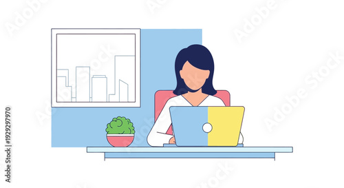 Young woman working on laptop at desk in modern office