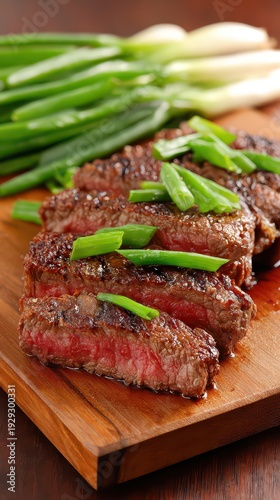 Sliced Grilled Beef with Green Onions Garnish on Wooden Board