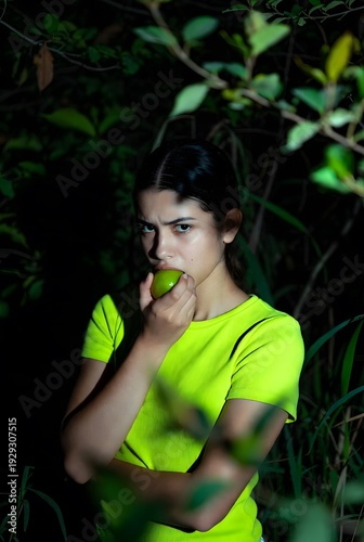 Fierce Woman with Lime in Mouth Under Eerie Green Glow