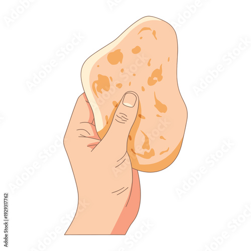 Hand holding a potato with spots.