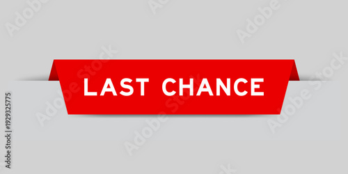 Red color inserted label with word last chance on gray background