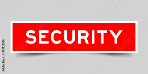 Red color square shape sticker label with word security on gray background
