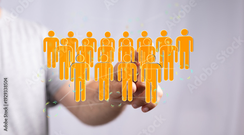 Hand pointing at a group of...
