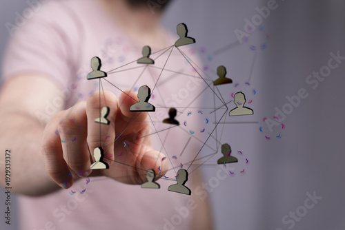 Person points at digital ne...