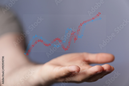 Close-up of a hand supporti...