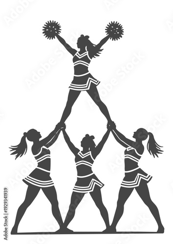 Cheerleader pyramid formation team stunt with top flyer raised high