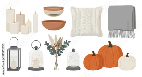 Autumnal home decor elements including pumpkins, candles, and cozy throw blanket.