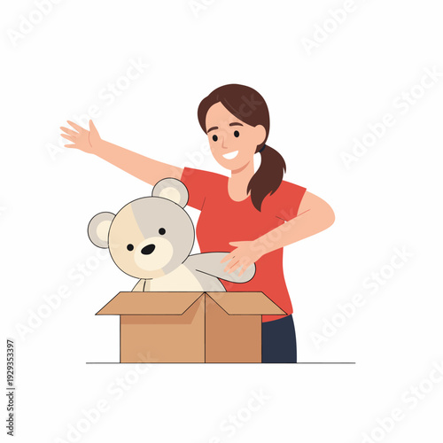 Smiling woman unpacking teddy bear from box.