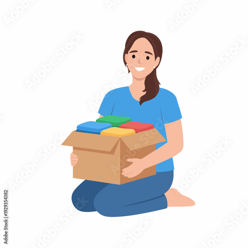 Woman holding box of clothes donation charity.