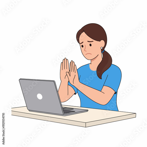 Woman praying in front of laptop praying online digital faith.