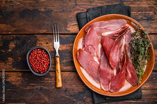 Tableau sur toile Tyrolean raw ham Speck, Italian sliced cured pork meat