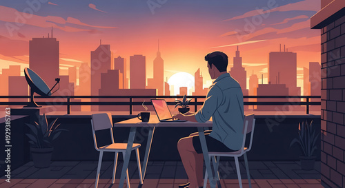 Man working on laptop at a rooftop desk with a city skyline at sunset