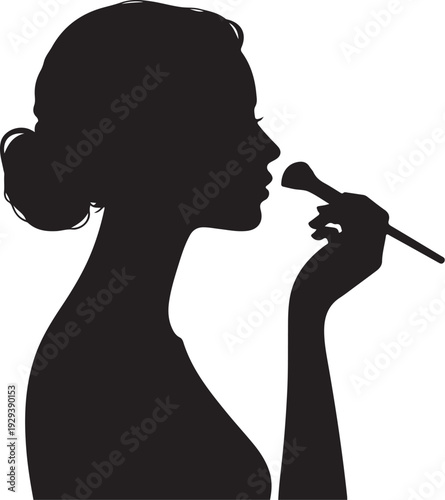 Black silhouette of woman applying makeup with brush