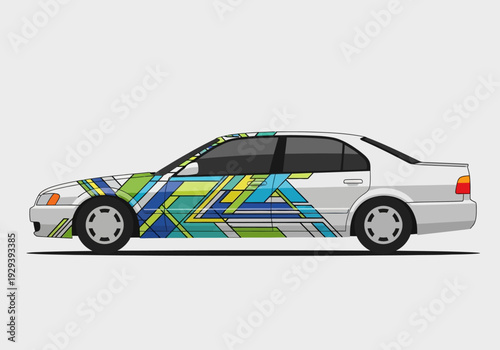 White sedan with abstract geometric blue and green livery side view