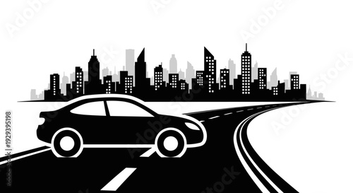 Sleek black car driving on a winding road.