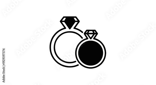 Two diamond rings, one larger than the other, on a white background