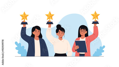 Team of three successful businesswomen holding up gold star trophies to celebrate their group achievement and victory.